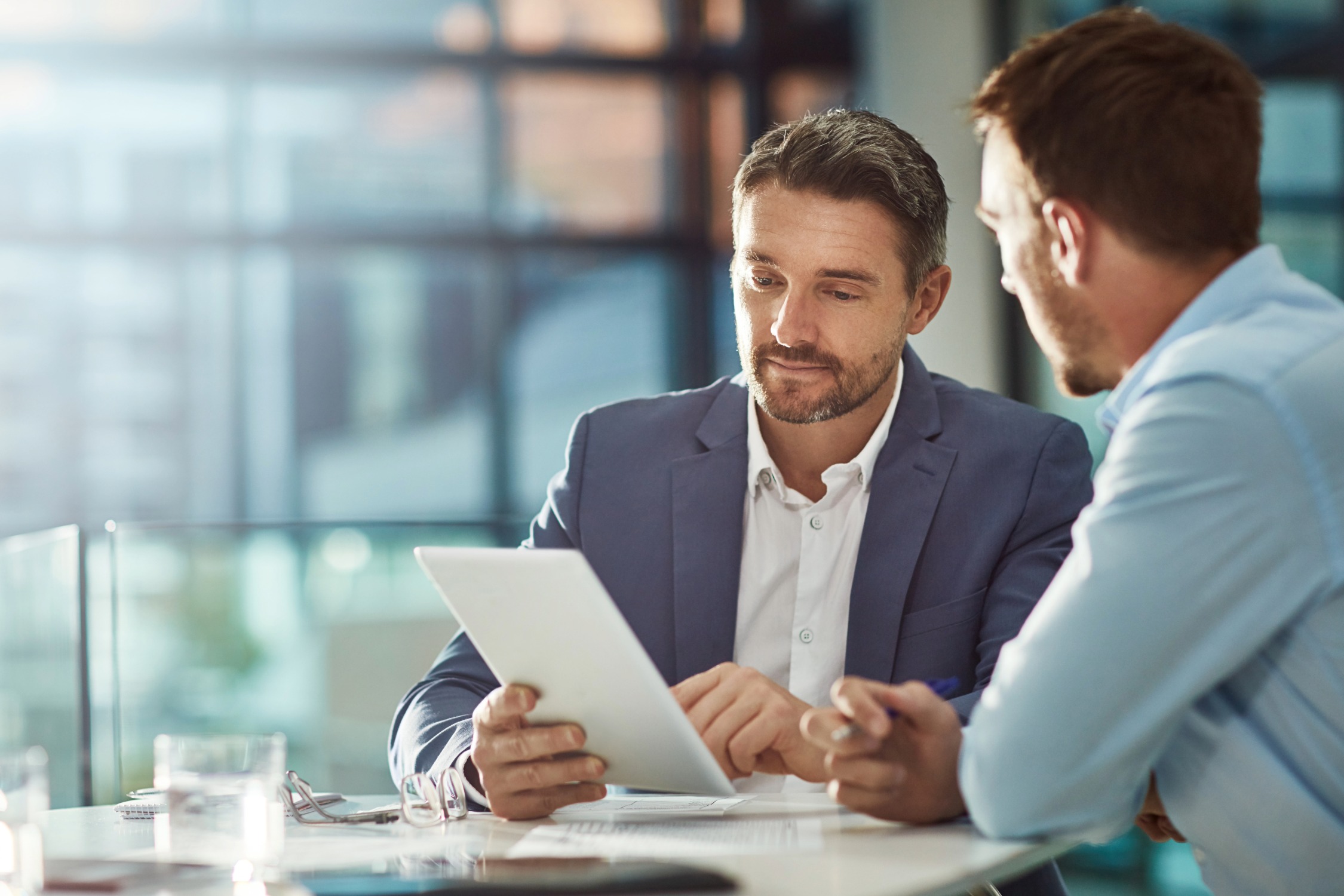 HR professionals reviewing employee documentation