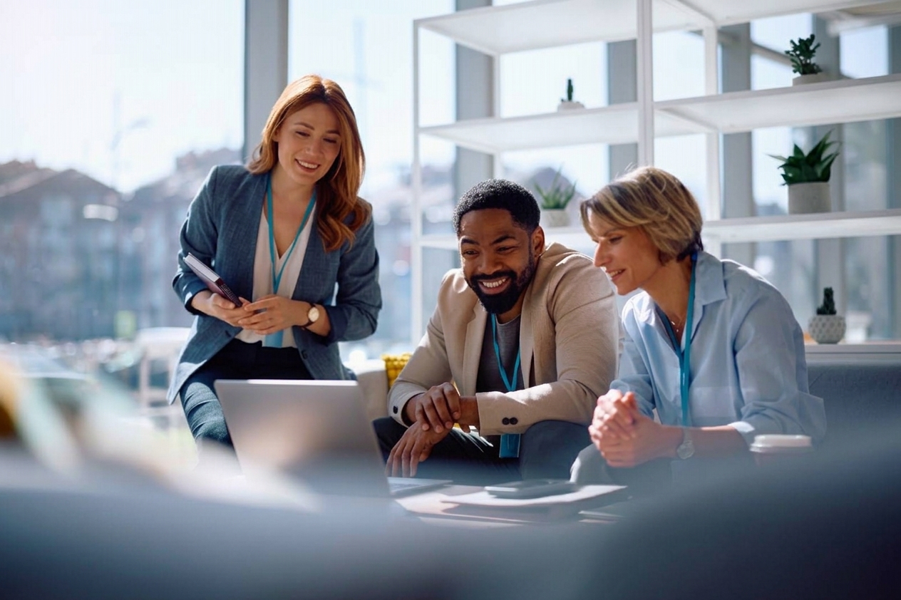 Colleagues collaborating at an office desk